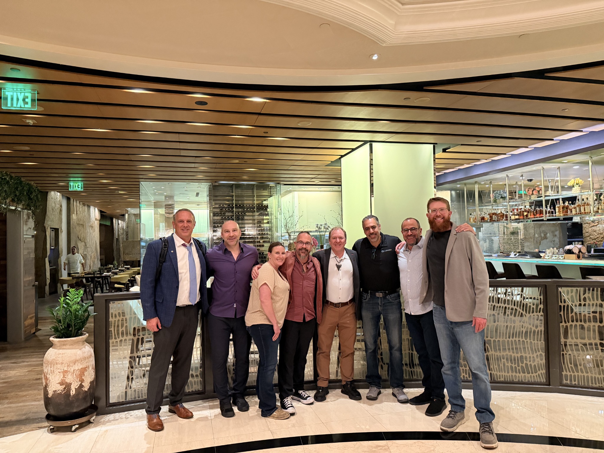 Tomas with a group in a restaurant